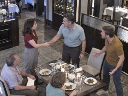 My younger brother smirked and introduced me to his CEO at his promotion dinner: “This is the one our family never figured out.” My parents avoided my eyes and said nothing. His CEO stayed silent, watching each person in the room. The air grew tense. Then he smiled and said, “Interesting… tell me your name again.”