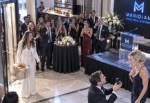 I opened the door to my husband’s company party with a gift in hand, only to see him on one knee proposing to his new CEO—my own stepsister. “Will you leave my poor, frigid wife and marry me?” he asked. Everyone laughed. Then my stepsister…
