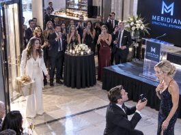 I opened the door to my husband’s company party with a gift in hand, only to see him on one knee proposing to his new CEO—my own stepsister. “Will you leave my poor, frigid wife and marry me?” he asked. Everyone laughed. Then my stepsister…