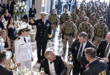 Dad ordered me to hide my Navy uniform behind the flowers. “No one cares about your government job,” he texted. Then 300 SEALs entered, an admiral saluted me, and FBI agents walked straight to his table. 300 SEALs entered.