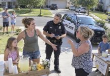 My neighbor actually called the police on my seven-year-old because her lemonade stand was getting more customers than her son’s. I thought she was bluffing—until a patrol car pulled up in front of our house and she stood there looking completely satisfied.