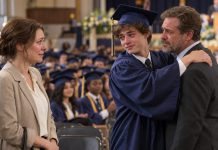 At my son’s high school graduation in Chicago, he reserved a front-row seat for a man I had never met. For eighteen years, I had worked two jobs to raise my son, always telling him that his father had left before he was born. When the man walked in, my son ran down to embrace him, then turned to look at me with tear-filled eyes. “Mom,” he said, “I knew he had been sending money every month. I just wanted to know why you had to bear it all alone.”