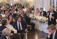 “My daughter deserves better than this,” someone from the wealthy family whispered while they laughed at the bride’s poor father. He heard every word, calmly walked to the microphone, and when he began to sing, nobody in the room was prepared for what they were about to witness.