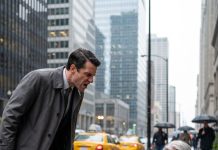 I kicked an old homeless woman for dirtying my suit on the way to an emergency meeting. When her coat ripped open, a silver necklace spilled onto the pavement—the exact one my mother wore before she vanished fifteen years ago.