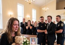 Everyone around us at the funeral thought I was setting Lily’s favorite bear beside her coffin to say goodbye. My five-year-old daughter’s stepfather, my husband, stood nearby repeating that she had died in an accident. With trembling fingers, I pressed the toy’s hidden playback button because I could not remember the exact sound of her laughter, and I needed to hear it. The chapel went quiet as the speaker came alive. Lily did not laugh. She begged him not to hurt her. Then my husband’s voice sounded from inside the bear. He stopped speaking to the mourners and stared at the toy as if it could bring down every cruel lie he had told.
