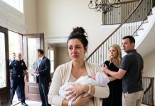 Three days after the surgeons brought my daughter into the world, I returned from the hospital still bleeding. My husband stood in our living room kissing another woman, beneath the photograph from our wedding day. For a moment, I thought he would see what I had survived and step away from her. Instead, he looked me in the eye and pointed outside.