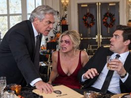 I walked into the Halloween party with one eye bruised black—and my husband raised his glass with a grin. “I’m the one who taught her a lesson—now she doesn’t need a costume.” The room erupted in laughter. Then my father stepped out from behind the masked guests, set a sealed police file on the table, and whispered, “Laugh while you still can.” The ballroom doors locked.