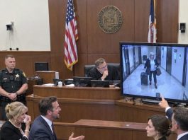 In court, my husband said, “She abandoned our baby.” I stood alone and said nothing. Then my attorney handed over the hotel security footage. The judge watched my mother-in-law carry my bag inside… My husband stopped breathing.