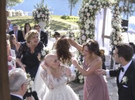 During our wedding vows, my sister-in-law ripped off my wig. “Now my brother can see the bald cancer patient he’s marrying!” My mother-in-law laughed. I froze in front of everyone… until my husband took the microphone.