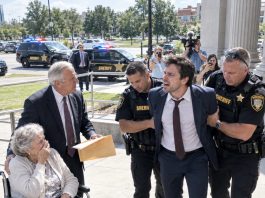 My son called me “mentally unstable” and my wife “disabled.” He wanted control of our assets. At the hearing, I handed the judge a sealed envelope. He read it, hit the emergency alarm, and ordered, “Lock every door. No one leaves this courtroom.” Everyone froze.
