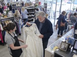 “We donated your late wife’s wedding dress,” my DIL smirked. I’d warned her never to touch that box. I found the dress at a thrift shop—then discovered her pearls were gone too. She thought I’d do nothing. But she’d forgotten one thing. I called my attorney. Two weeks later, she called me, her voice shaking… True life story.