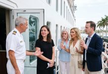 At our mother’s birthday dinner, my older sister bragged that her husband earned MORE IN ONE MONTH than I made in a year—then laughed at my simple dress. I smiled and thanked her. But the following weekend, when our family boarded their luxury cruise, the captain personally welcomed me: “Ma’am, your PRIVATE OWNER’S SUITE is ready.”