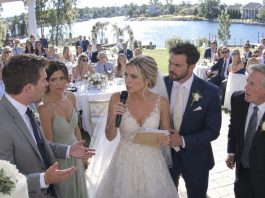 My brother staged a gender reveal at my wedding, then announced: “And now, the honeymoon belongs to us! Dad has already changed the names on the tickets.” The guests burst into cheers. My husband tightened his grip on my hand. I picked up the microphone and said, “Since we are making announcements…” All 87 guests fell silent.