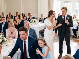 At my brother’s wedding, he mocked me for being a single dad and said no woman would ever want me. Everyone laughed—even our parents. Then the bride slowly stood, reached for the microphone, and the room went completely silent.