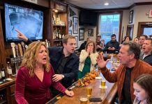 On Thanksgiving Eve, forty people gathered at Dad’s old bar as Mom toasted, “To my daughter the ghost, too busy sulking to come home.” The room burst into laughter. Then, without warning, every phone on the bar lit up at once. The TV followed. Mom kept laughing, confused by the sudden silence. “What is everyone looking at?” Then came the warning: “Mom, please don’t turn around.”