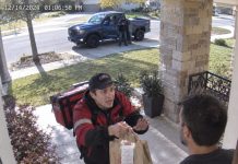 A food delivery driver ran to my door, terrified. He shoved the bag at me and whispered, “Don’t eat this. They paid me to deliver it. They’re in the blue truck. They showed me a gun. If you’re reading this, your son is…” His voice failed. The truck’s headlights flashed twice. Someone got out holding a terrifying thing. A red dot appeared on my head. What happened next is…