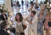 My husband and his family secretly booked a luxury vacation with my money, then laughed that I was “always trying too hard to fit in.” They thought I would never find out—until I walked into the hotel lobby and watched every smile disappear.