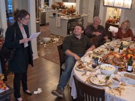 “Perfect timing—clean this up,” my brother mocked when I walked into the wreckage of Thanksgiving dinner, while my parents laughed behind him. I didn’t argue; I just reached into my bag and said, “Keep laughing.” Seconds later, the front door burst open and every smile disappeared.