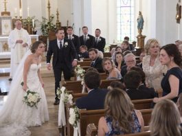 For 12 years, my family pretended I was dead after my mother publicly called me ugly. I never planned to return—until my spoiled sister’s wedding invitation arrived. The moment her groom saw me, he stopped breathing for a second. “Hannah? You’re the one who rebuilt my brother’s face!” he exclaimed. I stayed silent as 250 guests turned toward me—and my sister’s perfect wedding began falling apart…