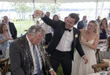 The groom laughed as champagne ran down my face, humiliating me in front of my own daughter. I remained completely calm and reached into my pocket. What I pulled out exposed a secret he had desperately hidden. Suddenly, the man who mocked me was begging for mercy.