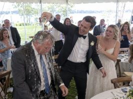 The groom laughed as champagne ran down my face, humiliating me in front of my own daughter. I remained completely calm and reached into my pocket. What I pulled out exposed a secret he had desperately hidden. Suddenly, the man who mocked me was begging for mercy.