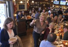 At a crowded Thanksgiving celebration, Mom publicly humiliated me, convinced I was too bitter to face the family. Then forty phones lit up simultaneously. When the television revealed why, the entire bar fell silent, but Mom was still laughing.
