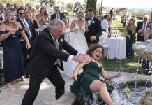 My entire family burst out laughing when I walked into my sister’s wedding alone, and my father humiliated me in front of everyone before shoving me straight into the fountain. Soaking wet, I looked him in the eye and said, “Remember this moment”—because twenty minutes later, the man I had secretly married arrived, and suddenly nobody was laughing.