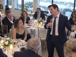 At his promotion party, my brother thought destroying me in public would make him look successful. He called me a useless freeloader while our family laughed, but they stopped the second I smiled and said, “Congratulations—you finally gave me the reason I needed to disappear from all of you.”