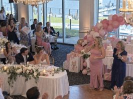 My sister turned my wedding into her baby shower, then announced she’d stolen our honeymoon with Mom’s help. When the guests started cheering, my husband whispered, “It’s time.” I stood up, smiled at my sister, and said, “Actually, I have an even bigger surprise.” Within seconds, nobody was celebrating anymore.