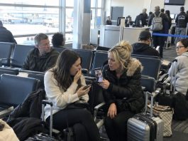 I thought the woman sitting next to me was just another stranger until she recognized the man on my phone. She showed me her wedding photo, and my stomach dropped. Her groom was the man in my picture.