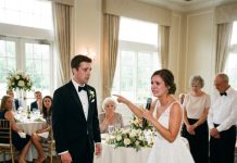 On my wedding day, I discovered that the main table had been rearranged. All nine seats were taken by my husband’s family, leaving my parents standing with nowhere to sit. His mother sneered, “They look poor.” Even worse, my husband agreed with her. I stood there in disbelief, then made one announcement that instantly ruined him…