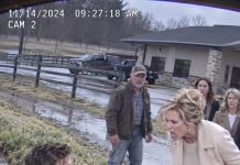 I was rescuing a newborn calf from a flooded ditch when the HOA president appeared and slapped me with a $10,000 fine for raising cattle. She laughed at my family ranch. Then I pointed toward her brand-new office and asked why it stood on my property.