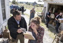 After my mother passed, I brought a crew to empty her old farmhouse. A few days later, the assessor called and said: “Miss, we found something. Something. Get here right now, and don’t tell your sister or your brother.” When I got there, police cars were already outside, and my heart dropped…