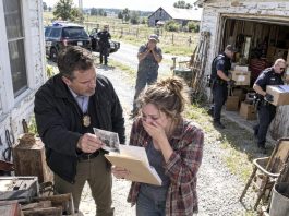 After my mother passed, I brought a crew to empty her old farmhouse. A few days later, the assessor called and said: “Miss, we found something. Something. Get here right now, and don’t tell your sister or your brother.” When I got there, police cars were already outside, and my heart dropped…