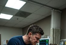 I was trapped under a collapsed building, bleeding out in the dark, when a young doctor pulled me free and saved my life. Sitting by my hospital bed later, he looked at me and asked, “You don’t remember me, do you?” I had no idea who he was until he whispered his name, and I completely broke down in tears.