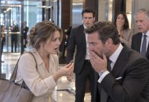 I was a poor assistant serving water at a billionaire’s business meeting when I noticed the silver ring on his finger. It matched the one my dead father left me. I pulled mine from beneath my blouse. The billionaire suddenly grabbed the table, trembling uncontrollably.