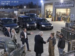My brother blocked our workshop with luxury cars and called my wife’s truck scrap. He demanded our land to cover his debts. Then a billionaire arrived, walked past him, and shook her hand.