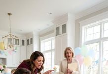 I was eight and a half months pregnant, covered in cake and crying over the wooden baby mobile my late father had made. My sister-in-law stood over me, convinced she’d finally broken me. Then my husband came home unexpectedly, looked at the shattered pieces, and silently held out his hand.