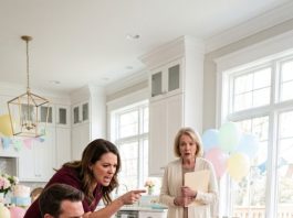 I was eight and a half months pregnant, covered in cake and crying over the wooden baby mobile my late father had made. My sister-in-law stood over me, convinced she’d finally broken me. Then my husband came home unexpectedly, looked at the shattered pieces, and silently held out his hand.