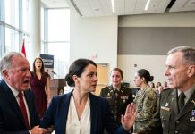 The room went silent at my sister’s promotion ceremony. Her commanding general had just stopped and asked: “Wait, is that Director Croft?” I was sitting in the back, the woman my family called a disgrace. My speechless father had never known…
