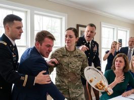 I sat beside the kitchen while my brother claimed the Diyala Valley mission. Fourteen men rescued. Twenty-eight guests listening. Mom beaming. “Let your brother speak,” she laughed.Then the 4-star general noticed my subdued collar and stood. He walked straight toward me. “Reaper… why are you sitting here?” he whispered. A moment later: “Stand at attention, everyone!”