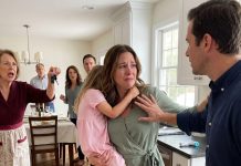 My husband slapped me across the face for refusing to cook while my daughter’s fever hit 104°F. My mother-in-law ordered me to stay for her guests instead of taking her to a doctor. “Stop embarrassing this family!” she snapped. I picked up my daughter, walked out, and made one phone call…