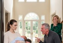 The day I brought my newborn home, my in-laws were waiting at the door with trash bags to throw me out, claiming the baby wasn’t my husband’s. I didn’t cry; I just handed my husband a sealed hospital envelope and watched his whole world collapse.
