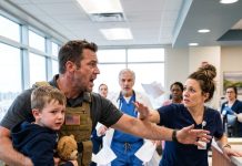 I shouted for help the moment I realized my son was no longer answering me. We had entered the hospital. His teddy bear was trapped between us as I carried him past reception. A nurse blocked my path, checked my identification, and interrupted my explanation: “Security is already coming for you.”