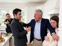 “Dad, please don’t ask,” my daughter whispered beside the kitchen wall. Eight months pregnant, she was shaking. I had come to visit, carrying fresh flowers and a stupid little teddy bear.