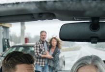 My heart shattered when my own son and daughter-in-law lied, taking me out for the day only to abandon me cold-heartedly at a highway rest stop with a fake promise: “We’ll be back.” Three hours later, my 24-year-old grandson drove 200 miles just to rescue me. As I got into his car, I whispered: “Don’t call your parents. There’s somewhere we need to go. Now…”