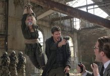 Upon entering the dilapidated warehouse, seeing my sister hanging from above, bruised and restrained, my internal temperature plummeted. Behind the bright glow of a notebook screen, her husband smiled wickedly, claiming she was his to keep. Taking off my gloves deliberate and slow, I turned my gaze to the riflemen lined up behind me. “No,” I uttered sharply. “Her blood is mine.” As dawn approaches, one reigning order will sink into ashes as a new power takes form. He hasn’t figured out who wins yet.