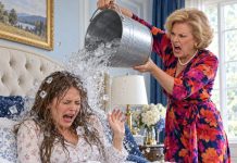 “Please, don’t ruin us!” My husband screamed those words on his knees when three black SUVs arrived. Minutes earlier, he had watched his mother empty a bucket of ice water over me during our family gathering. I was burning with fever. “Stop pretending, you disrespectful bitch! Get up and cook!” she shouted. Shivering uncontrollably, I crawled outside, collapsed at the doorway, and begged for help. Then the SUV doors opened, and everything changed.
