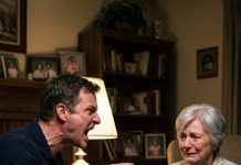 At 2:30 AM, my mother called from the police station, bruised and weeping after my husband claimed she attacked him with a fireplace poker. I drove over in dead silence, armed with the one impossible truth that was about to ruin him forever.