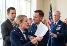 “Do you know who she is?” the base general asked the major, his face pale after seeing my badge. Moments earlier, my husband’s friend had publicly humiliated me before 40 guests: “Fake officer! That badge is a joke!” He accused me of stolen valor. My husband said nothing. I stayed calm as everything suddenly changed.